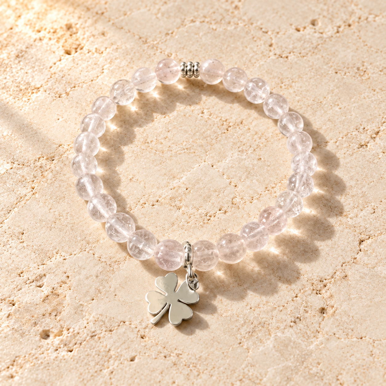 Bracelet en quartz rose avec trèfle argenté