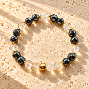 Bracelet en Hématite et Cristal de Roche avec détails dorés – Les Pierres de Lily